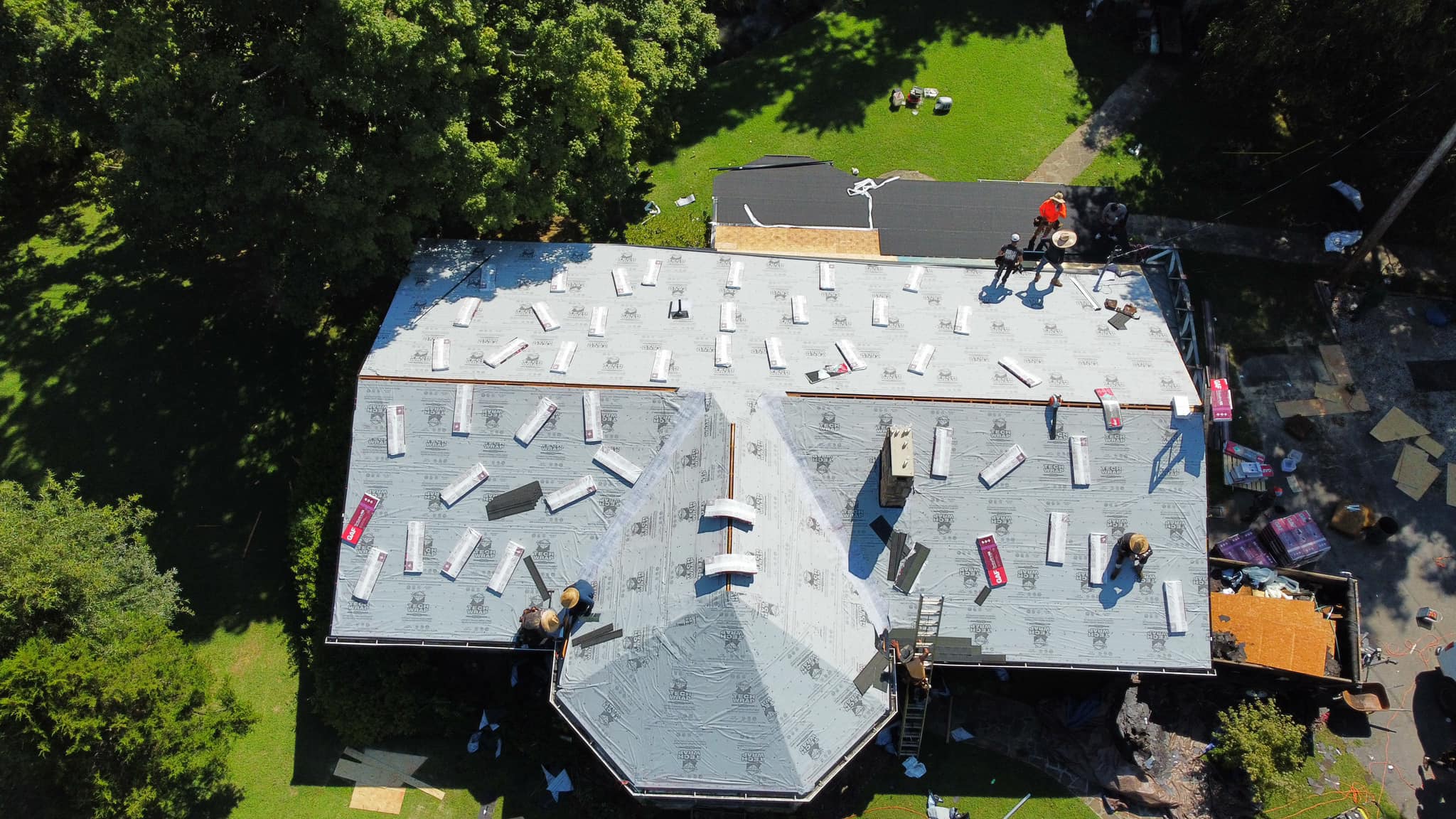 Srande Calhoun Ga Overhead Shot of Roofers Working on a Roof Replacement