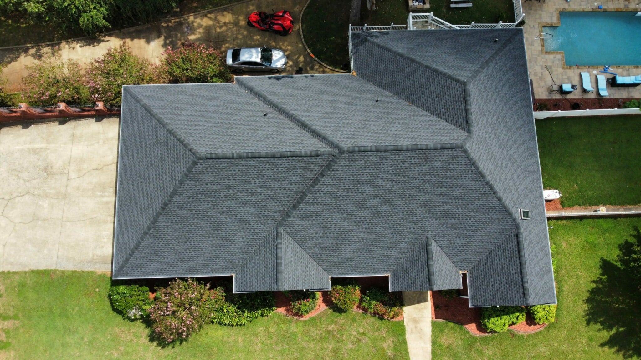 SRANDE overhead view of a finished residential roofing project